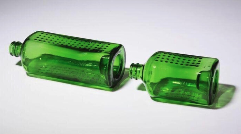 'WOBO (World Bottle)', designed by N. John Habraken, 1963. Green glass beer bottle. 35cl